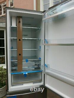 John Lewis upright fridge freezer with 2 freezer draws, used for 3 weeks only